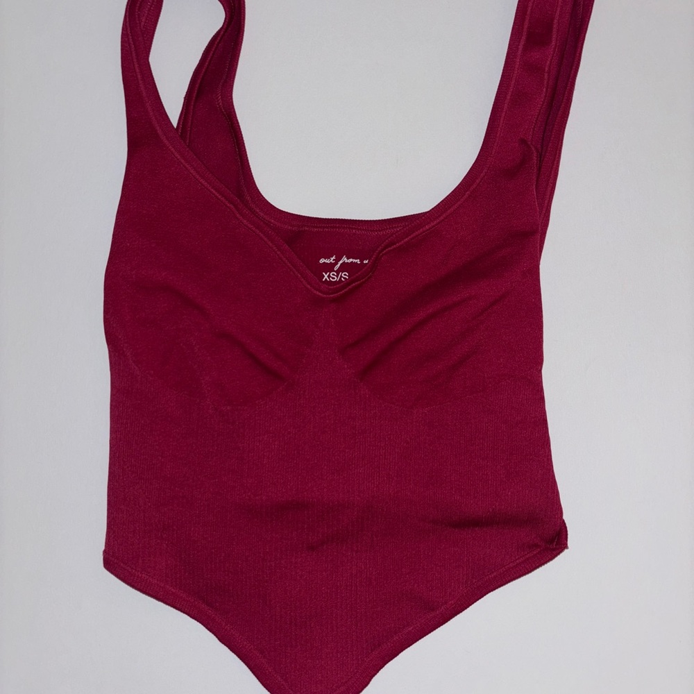 Dark pink out from under corset tank top